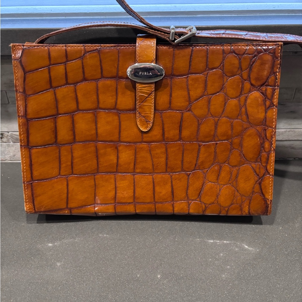 Furla Brown Leather women’s pocketbook made in Italy. 11” by 8”